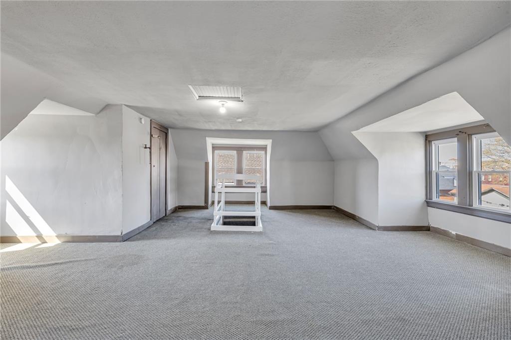 427 Jackson Street Rochester, PA 15074 - Photo 16 of 20 an empty room with windows
