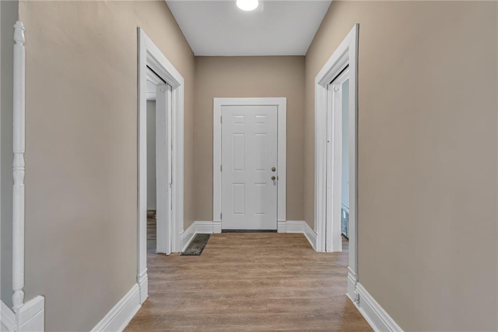 427 Jackson Street Rochester, PA 15074 - Photo 9 of 20 a view of a room with wooden floor
