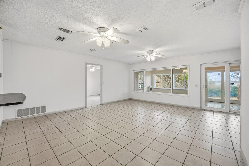 216 Broken Arrow Comanche, TX 76442 - Photo 12 of 38 a view of an empty room and window