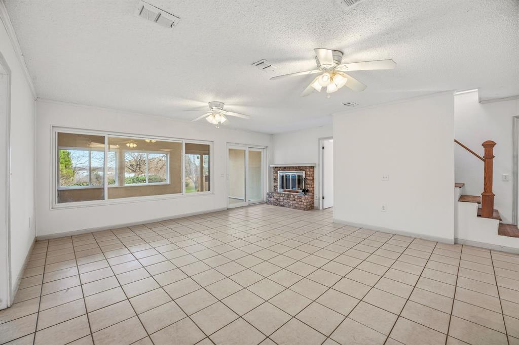 216 Broken Arrow Comanche, TX 76442 - Photo 13 of 38 a view of an empty room with a window
