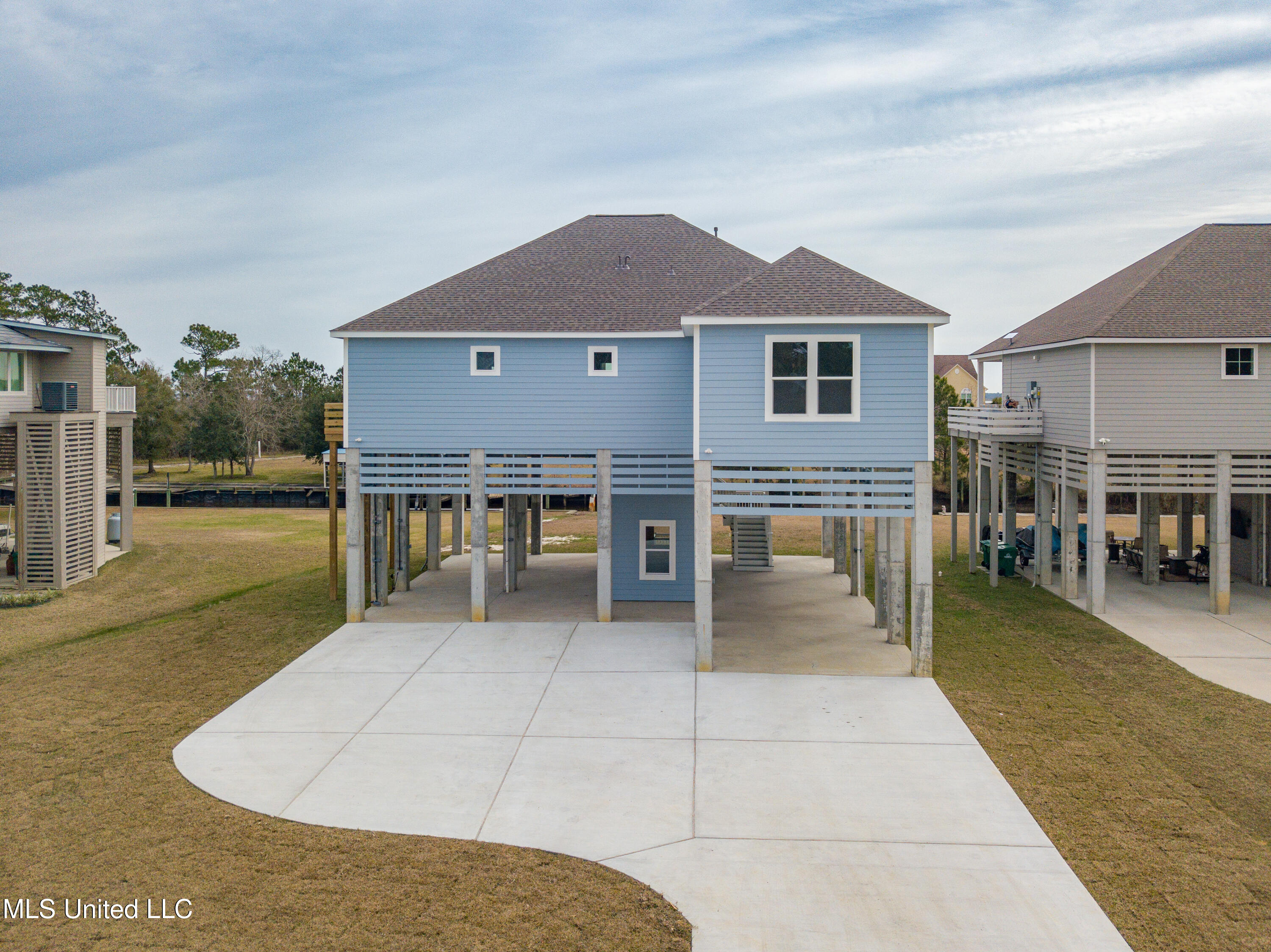 1324 Enos Street Diamondhead, MS 39525 - Photo 1 of 80 Enos St-1-1