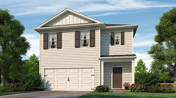 a front view of a house with garage