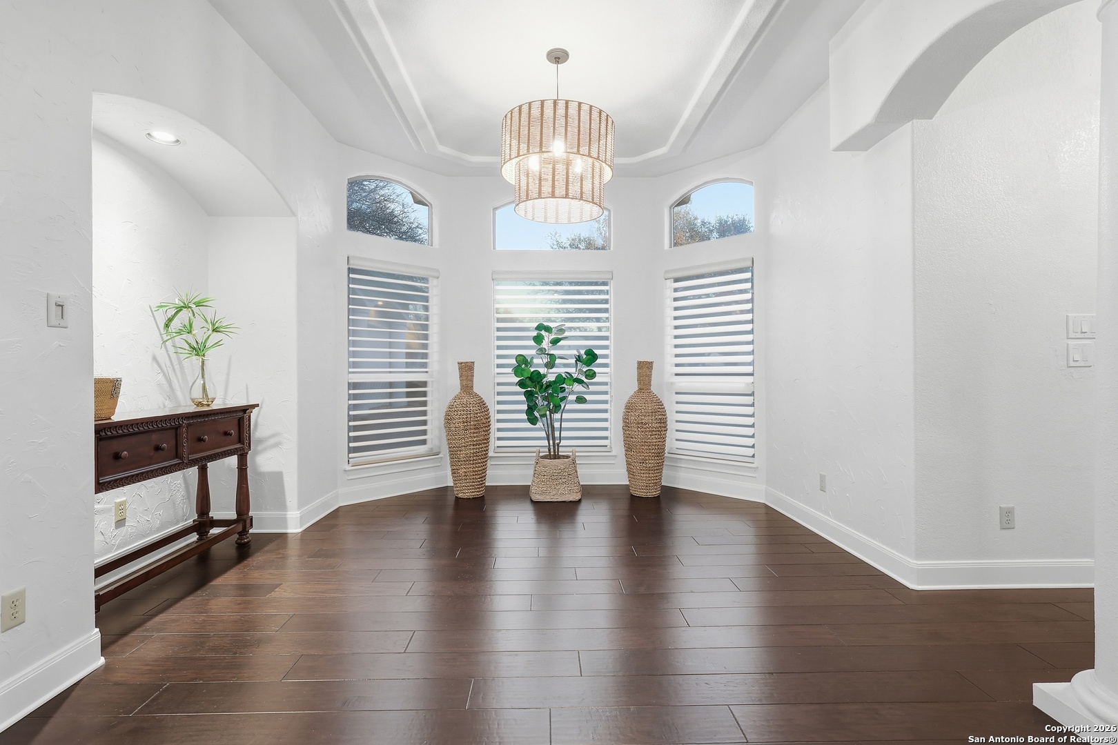 2435 Winding View San Antonio, TX 78260 - Photo 26 of 57 a view of an empty room with wooden floor and a window
