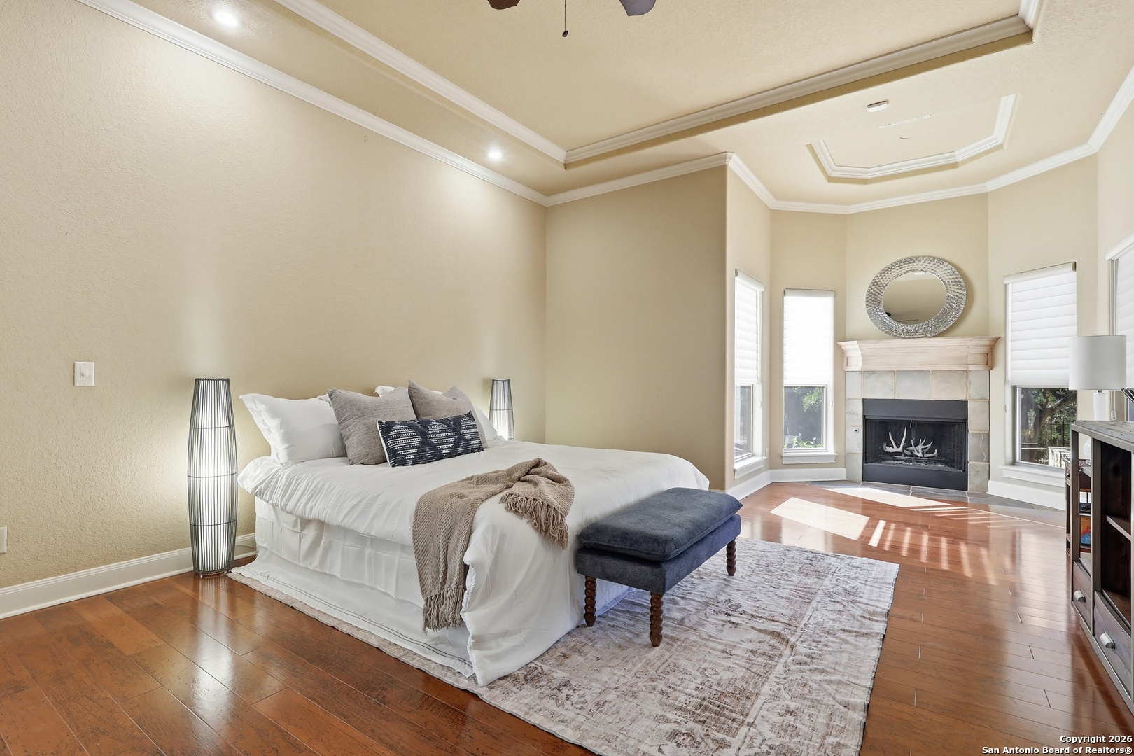 2435 Winding View San Antonio, TX 78260 - Photo 29 of 57 a bed room with a bed and a fireplace