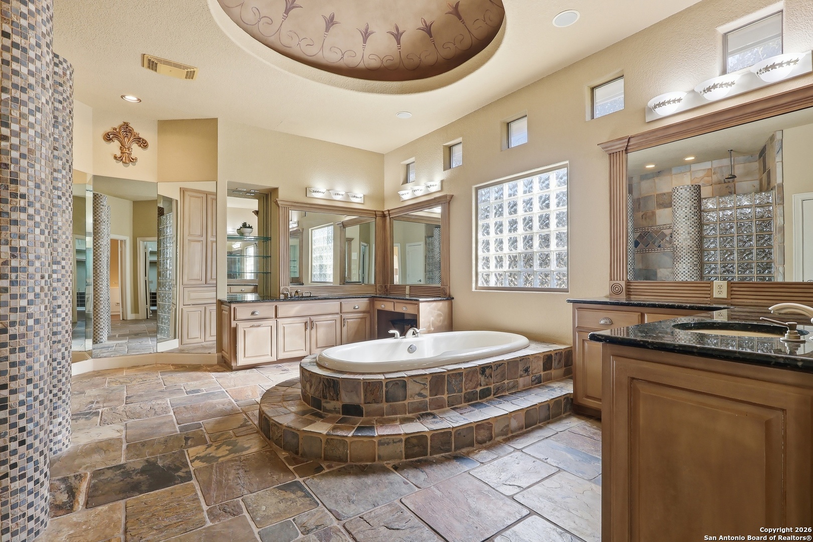 2435 Winding View San Antonio, TX 78260 - Photo 31 of 57 a room with a large window and chandelier