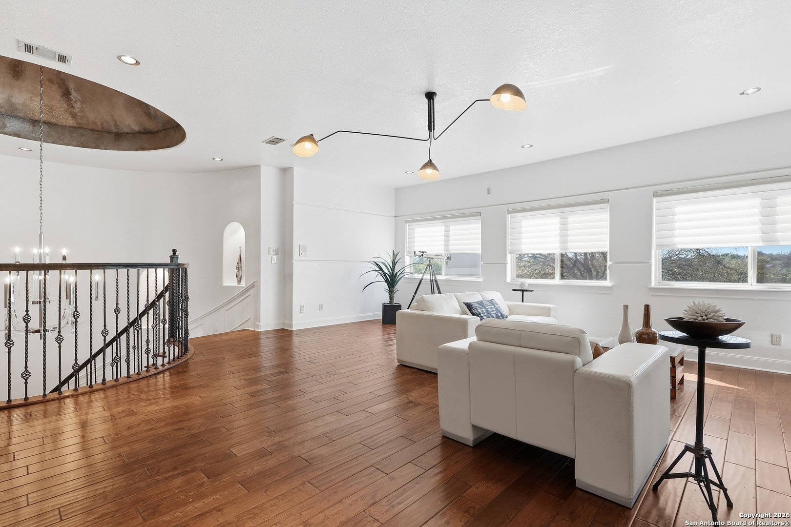 2435 Winding View San Antonio, TX 78260 - Photo 40 of 57 a living room with furniture and wooden floor