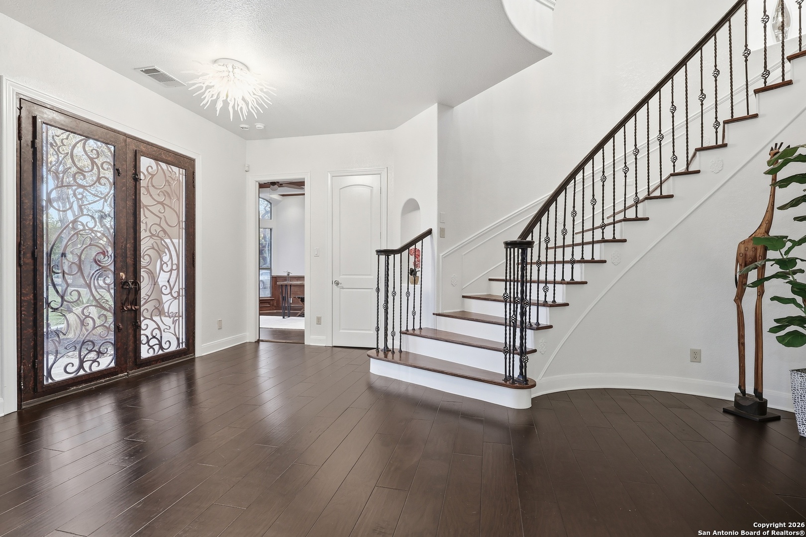 2435 Winding View San Antonio, TX 78260 - Photo 4 of 57 a view of an entryway with wooden floor