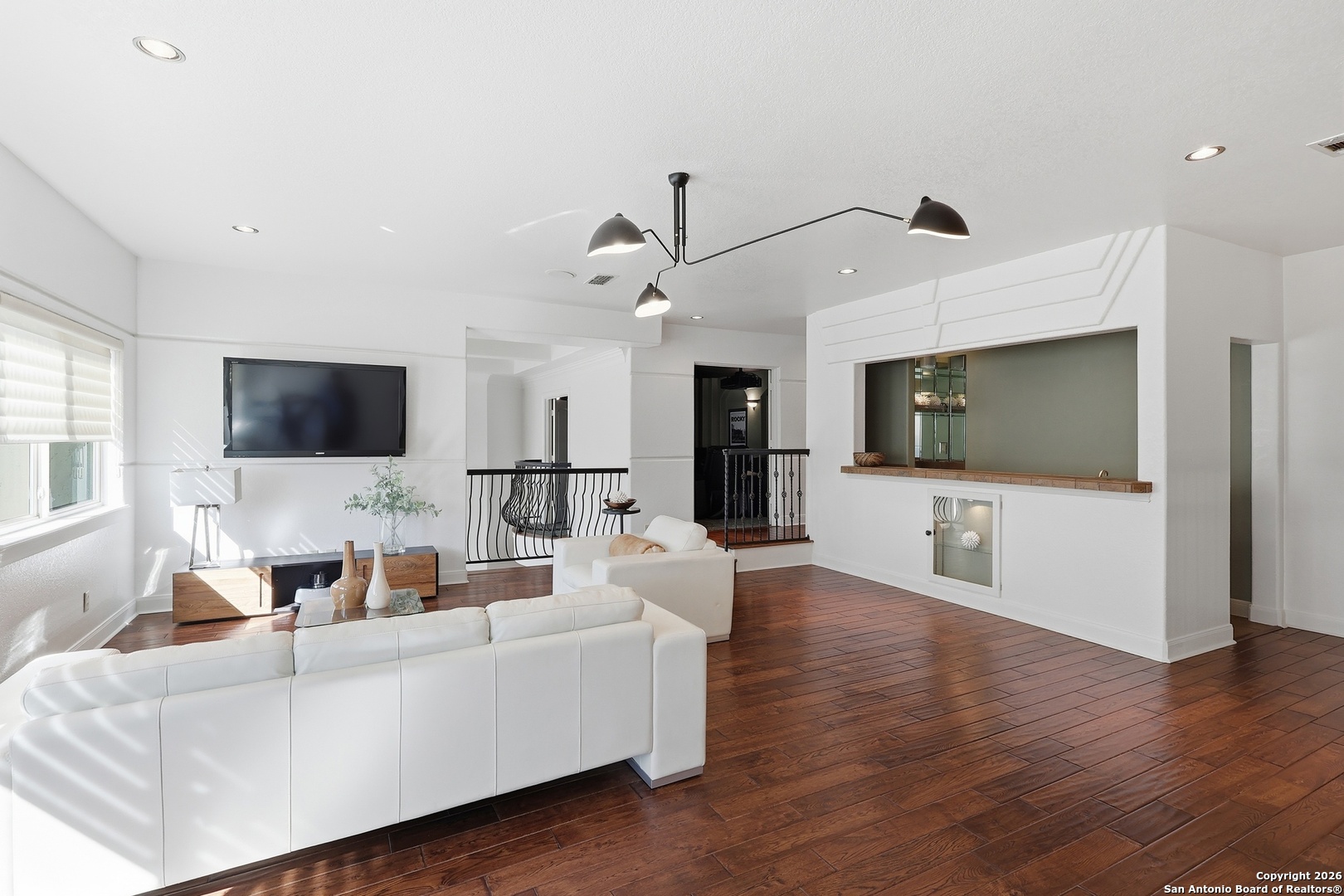 2435 Winding View San Antonio, TX 78260 - Photo 41 of 57 a living room with furniture and a flat screen tv