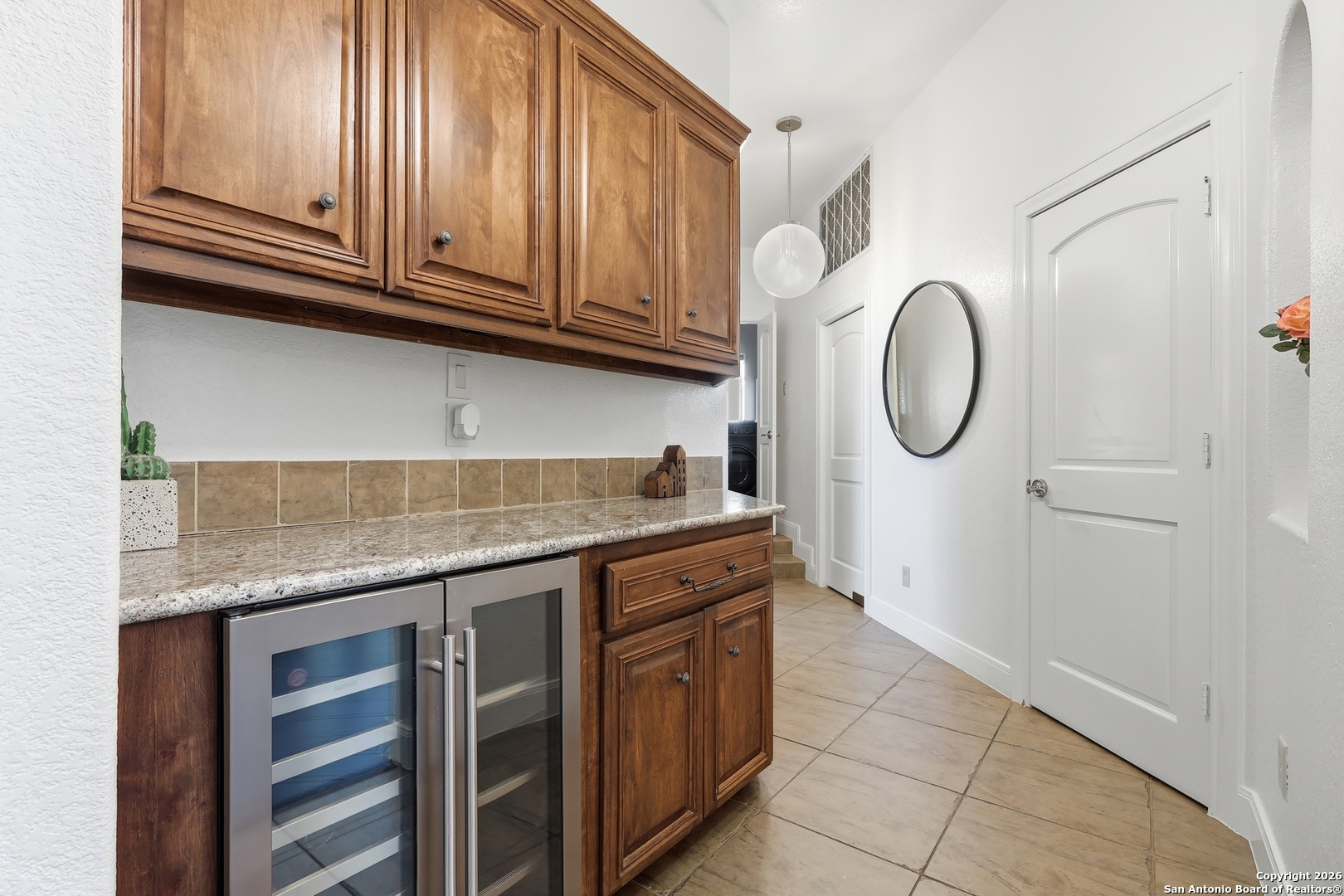 2435 Winding View San Antonio, TX 78260 - Photo 52 of 57 a kitchen with stainless steel appliances granite countertop a sink and a stove
