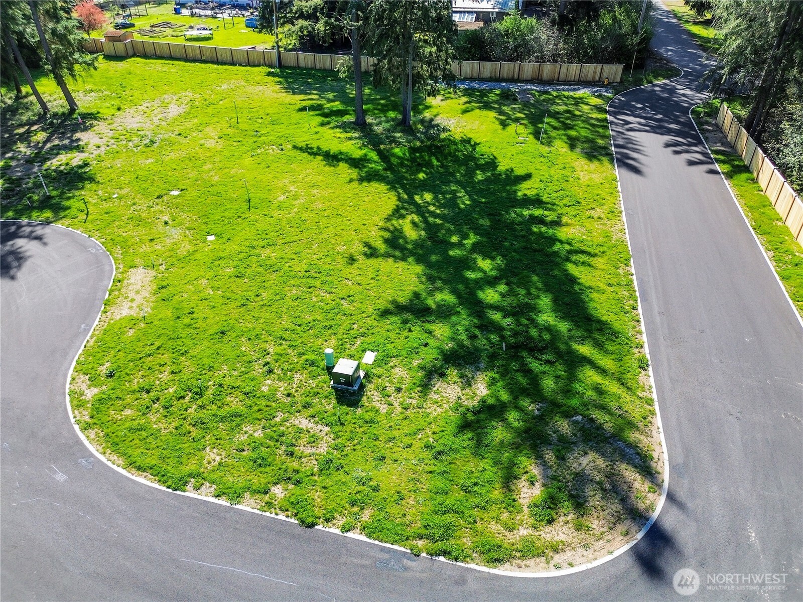 19604 95th Avenue East Graham, WA 98338 - Photo 8 of 12 a view of a garden with a lake