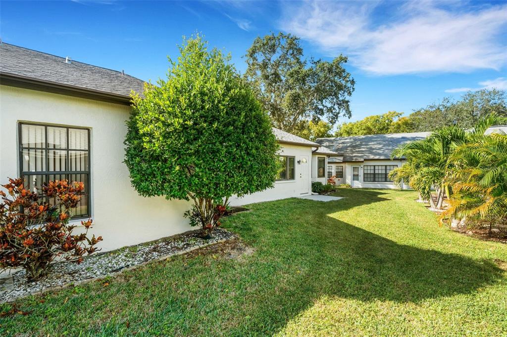 3681 Ridgemont Court Palm Harbor, FL 34684 - Photo 43 of 81 a front view of a house with garden