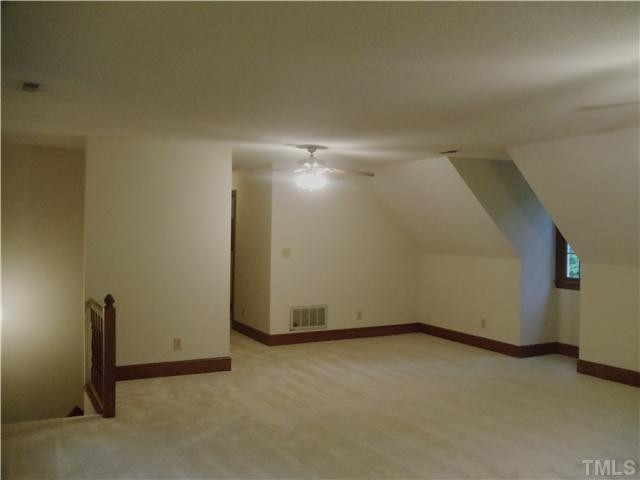 11924 Appaloosa Run East Raleigh, NC 27613 - Photo 17 of 20 Tremendous size bonus room over double car garage! Enter from second floor office or second staircase. Great storage areas and 8 windows! Room is 19.2 X 25. Wired for tv reception and computer! Two ceiling fans. Bonus Room