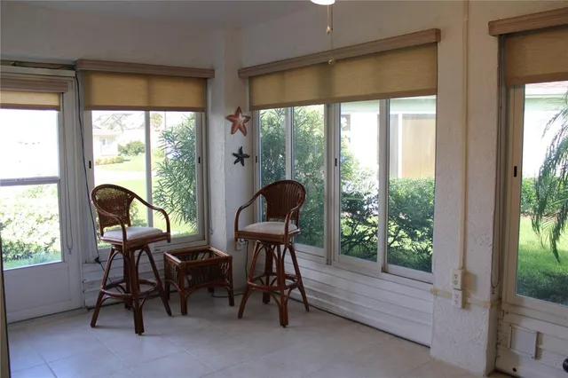 a workspace with furniture and a window