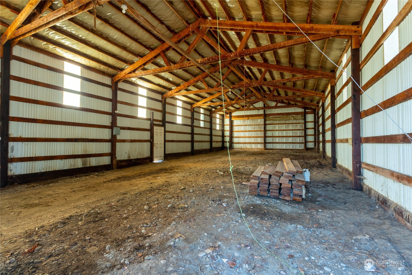 7992 Flynn Road Lynden, WA 98264 - Photo 31 of 39 a view of a room with wooden walls
