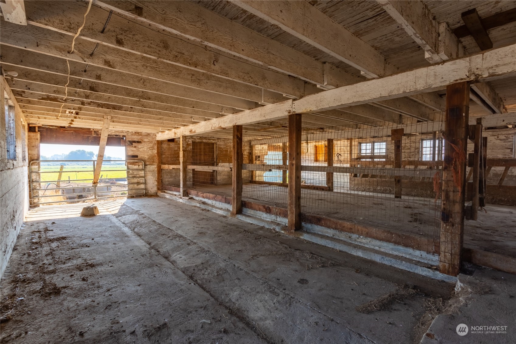 7992 Flynn Road Lynden, WA 98264 - Photo 34 of 39 a view of an empty room with wooden floor