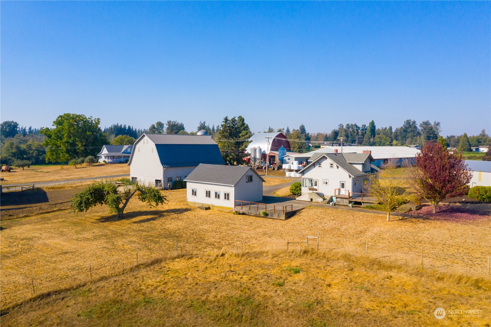 7992 Flynn Road Lynden, WA 98264 - Photo 4 of 39 a view of a house with outdoor space and sitting area