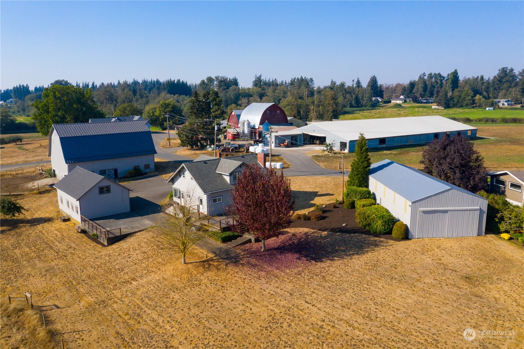 7992 Flynn Road Lynden, WA 98264 - Photo 5 of 39 a view of a house with outdoor space and sitting area