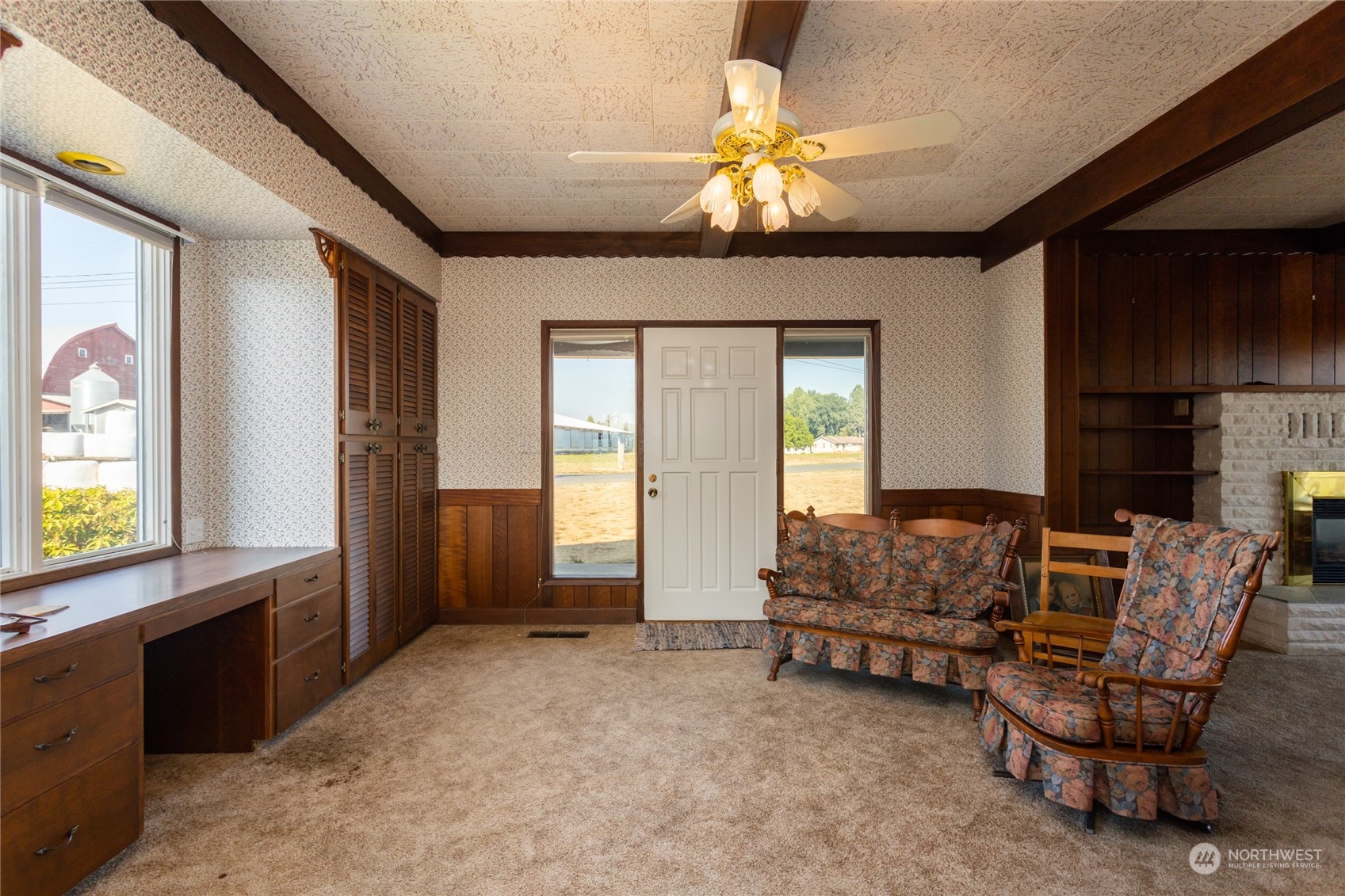 7992 Flynn Road Lynden, WA 98264 - Photo 9 of 39 a living room with furniture and a chandelier