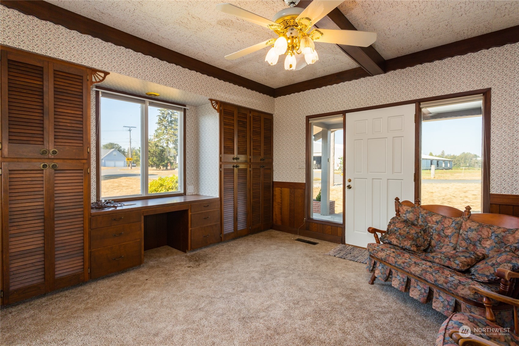 7992 Flynn Road Lynden, WA 98264 - Photo 10 of 39 a living room with furniture and a large window