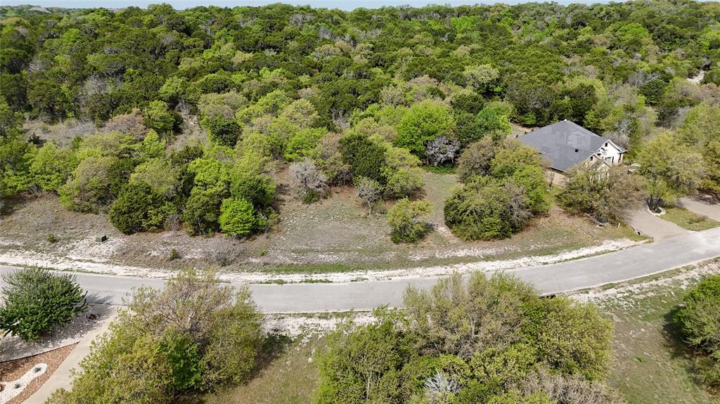 8532 Summerhill Lane Cleburne, TX 76033 - Photo 3 of 10 a view of a yard with a house
