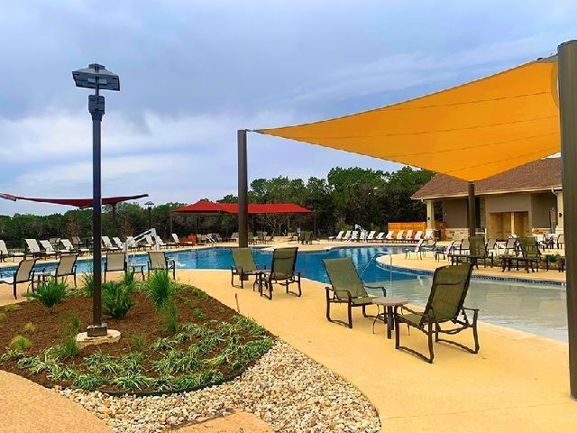 8532 Summerhill Lane Cleburne, TX 76033 - Photo 9 of 10 a swimming pool with outdoor seating