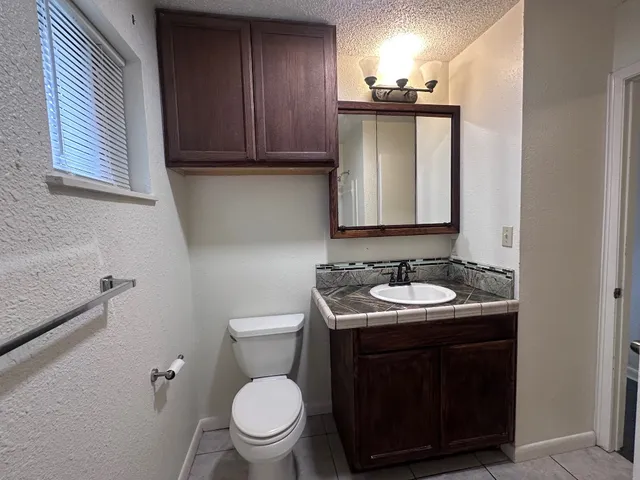 a bathroom with a sink and a toilet
