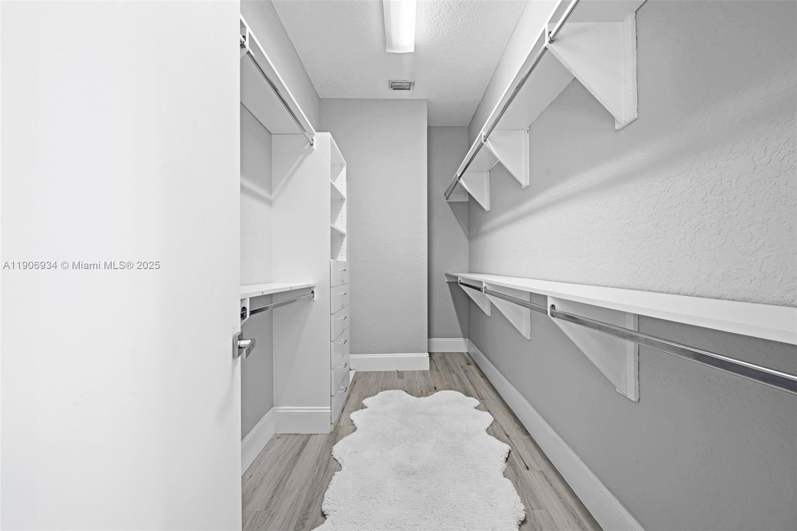 18715 Ocean Mist Drive Boca Raton, FL 33498 - Photo 28 of 44 a view of entryway and hall