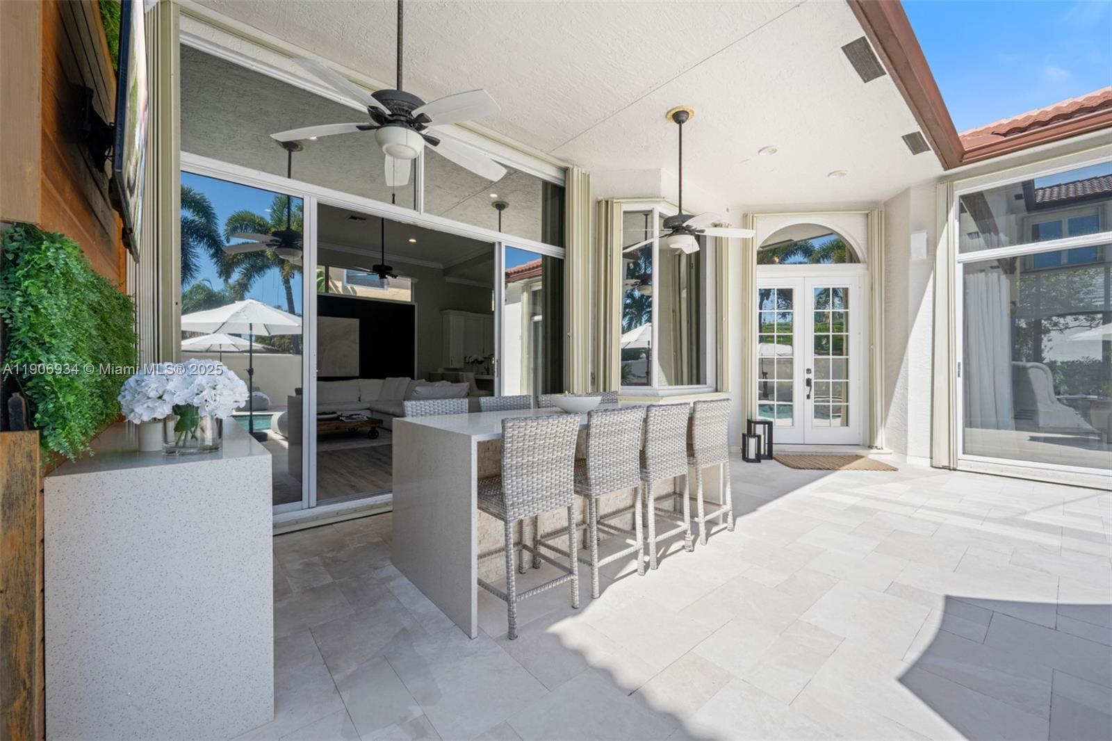 18715 Ocean Mist Drive Boca Raton, FL 33498 - Photo 32 of 44 a view of a dining room with furniture window and outside view