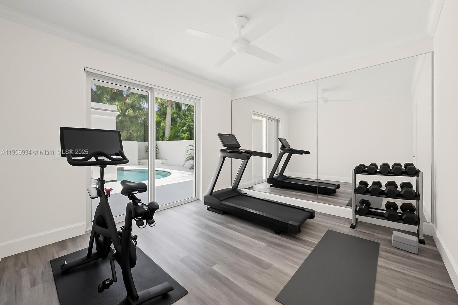 18715 Ocean Mist Drive Boca Raton, FL 33498 - Photo 44 of 44 a view of a room with gym equipment
