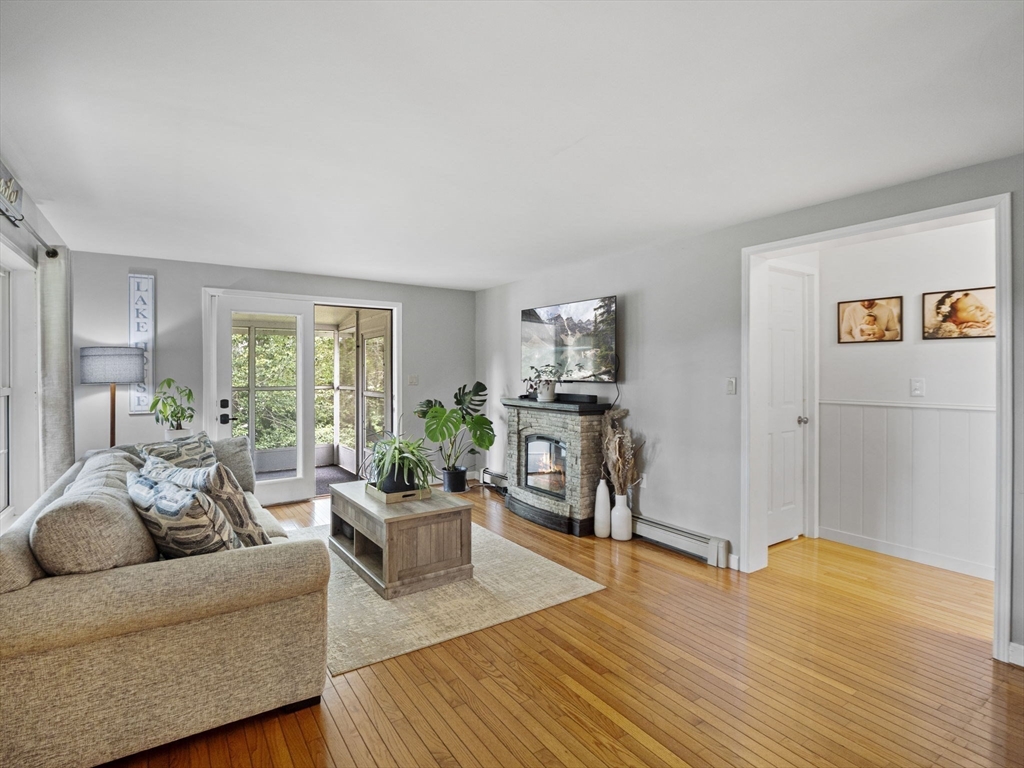 83 Lake Street Acushnet, MA 02743 - Photo 12 of 39 a living room with furniture and a flat screen tv