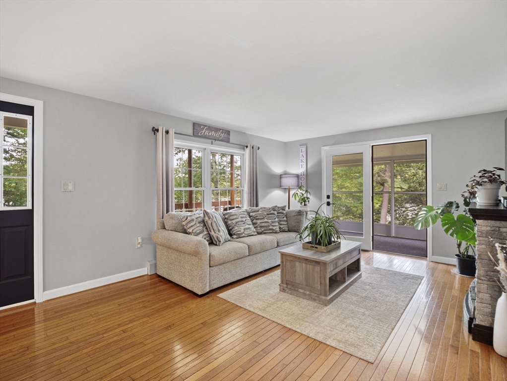 83 Lake Street Acushnet, MA 02743 - Photo 14 of 39 a living room with furniture and a large window
