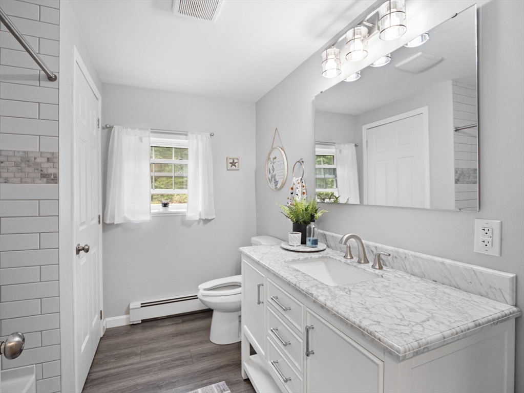 83 Lake Street Acushnet, MA 02743 - Photo 18 of 39 a bathroom with a granite countertop double vanity sink and a mirror