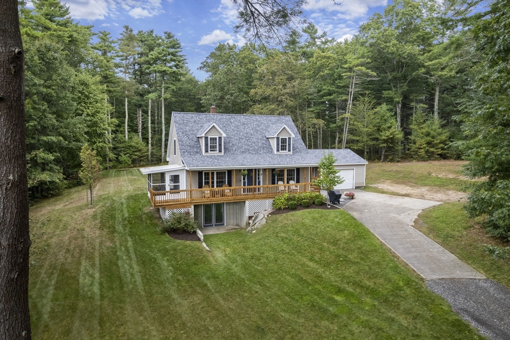 83 Lake Street Acushnet, MA 02743 - Photo 2 of 39 an aerial view of a house with a big yard