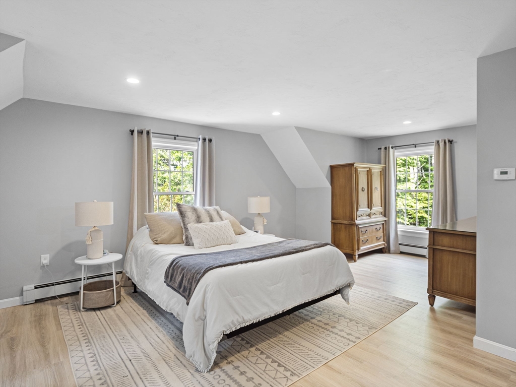 83 Lake Street Acushnet, MA 02743 - Photo 22 of 39 a bedroom with a bed and a couch