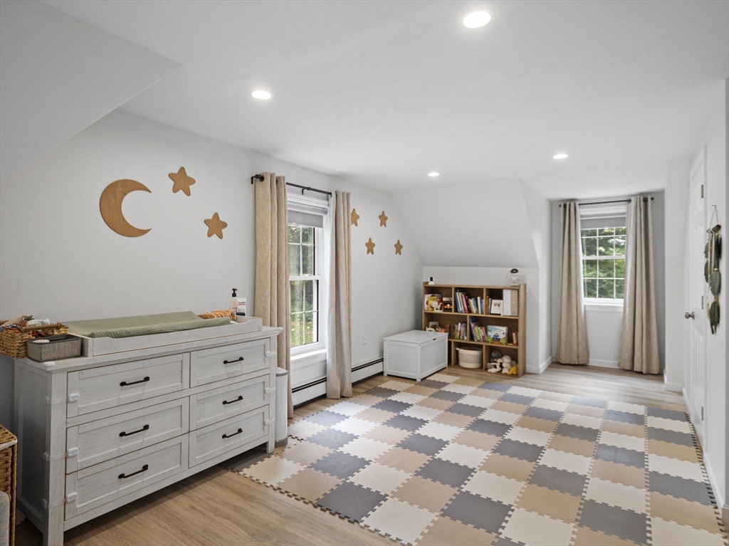 83 Lake Street Acushnet, MA 02743 - Photo 25 of 39 a view of a bedroom with furniture and window