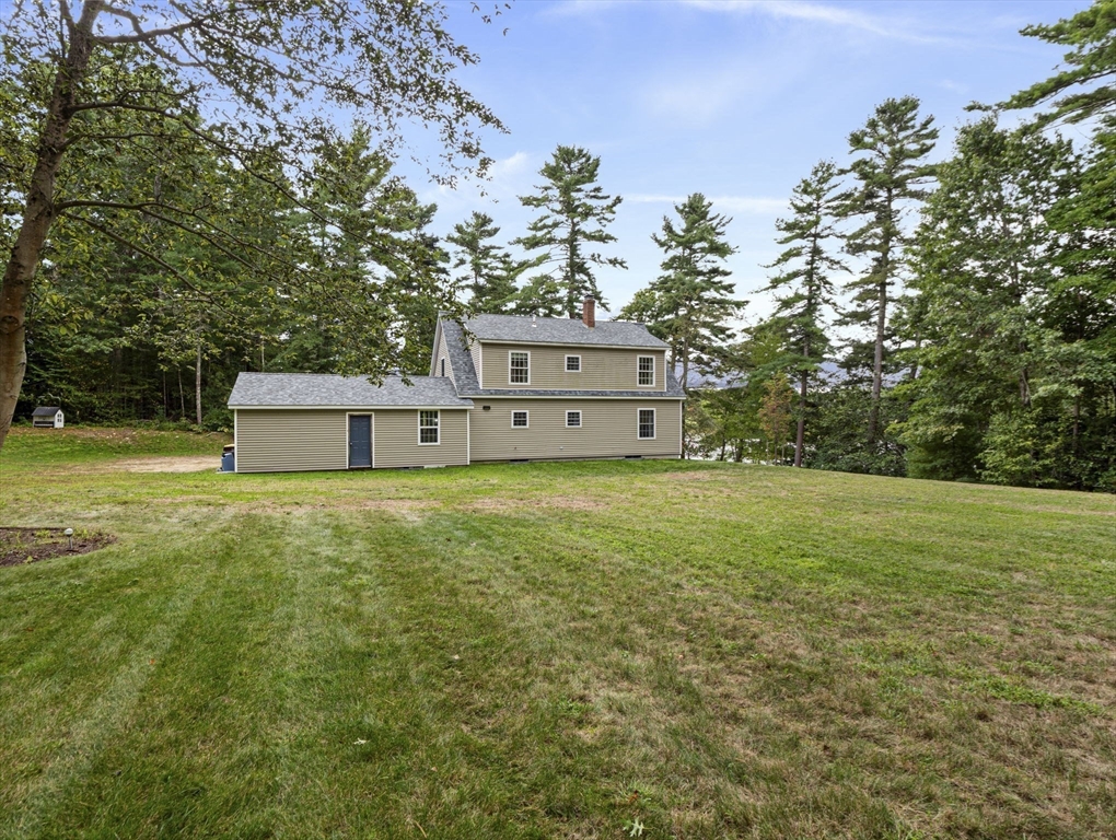 83 Lake Street Acushnet, MA 02743 - Photo 5 of 39 a view of a house with a yard
