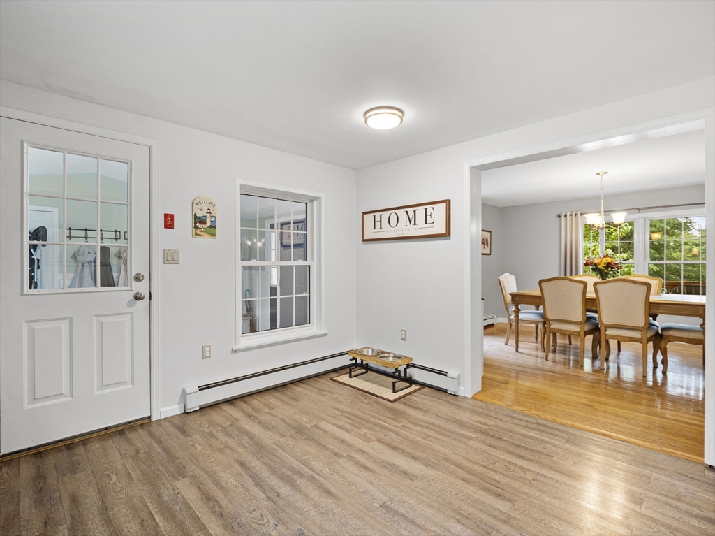 83 Lake Street Acushnet, MA 02743 - Photo 7 of 39 a view of a livingroom with furniture and wooden floor