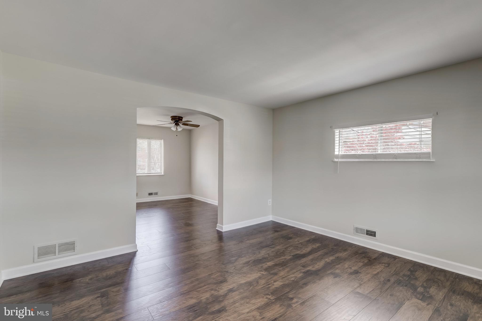 8043 Wallace Road Dundalk, MD 21222 - Photo 5 of 35 Living Room w./ new flooring