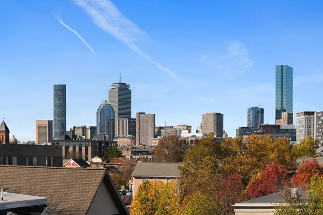 a view of a city with tall buildings