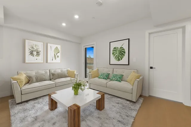 a living room with furniture and a couch