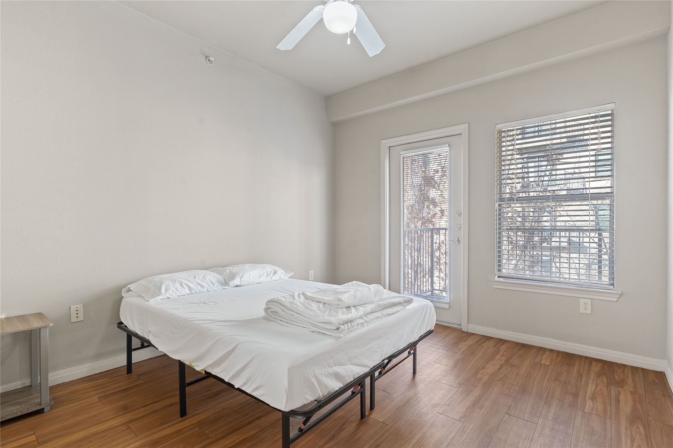 2515 Pearl Street, Unit 207 Austin, TX 78705 - Photo 1 of 1 a view of a dining room with furniture and wooden floor