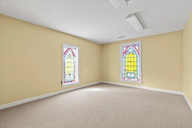 a view of a livingroom with furniture and a couch