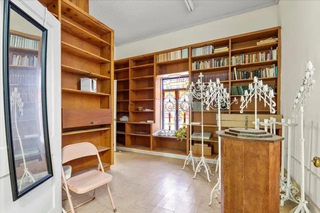 a view of a livingroom with furniture and windows