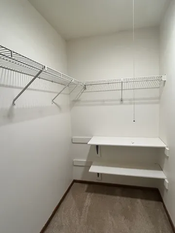 a view of a room with racks on the wall