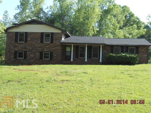 1356 Patterson Road Griffin, GA 30223 - Photo 1 of 1 a front view of a house with a yard