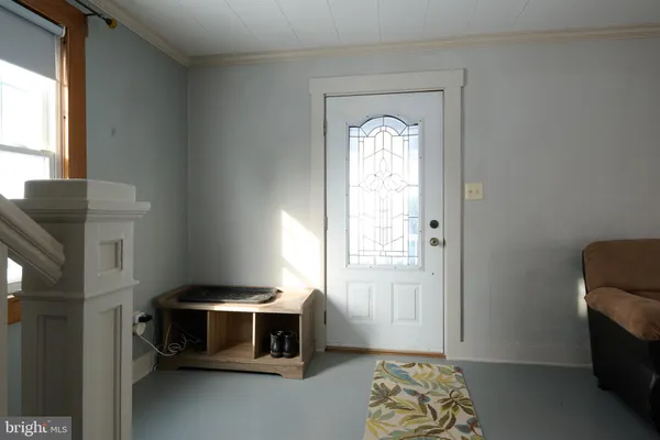 a view of livingroom with furniture and windows