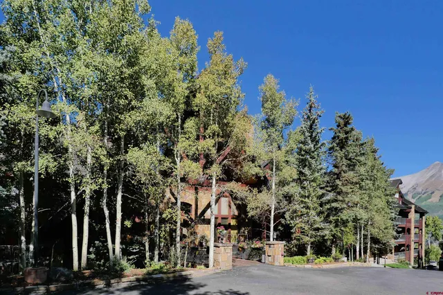 a view of a street with houses