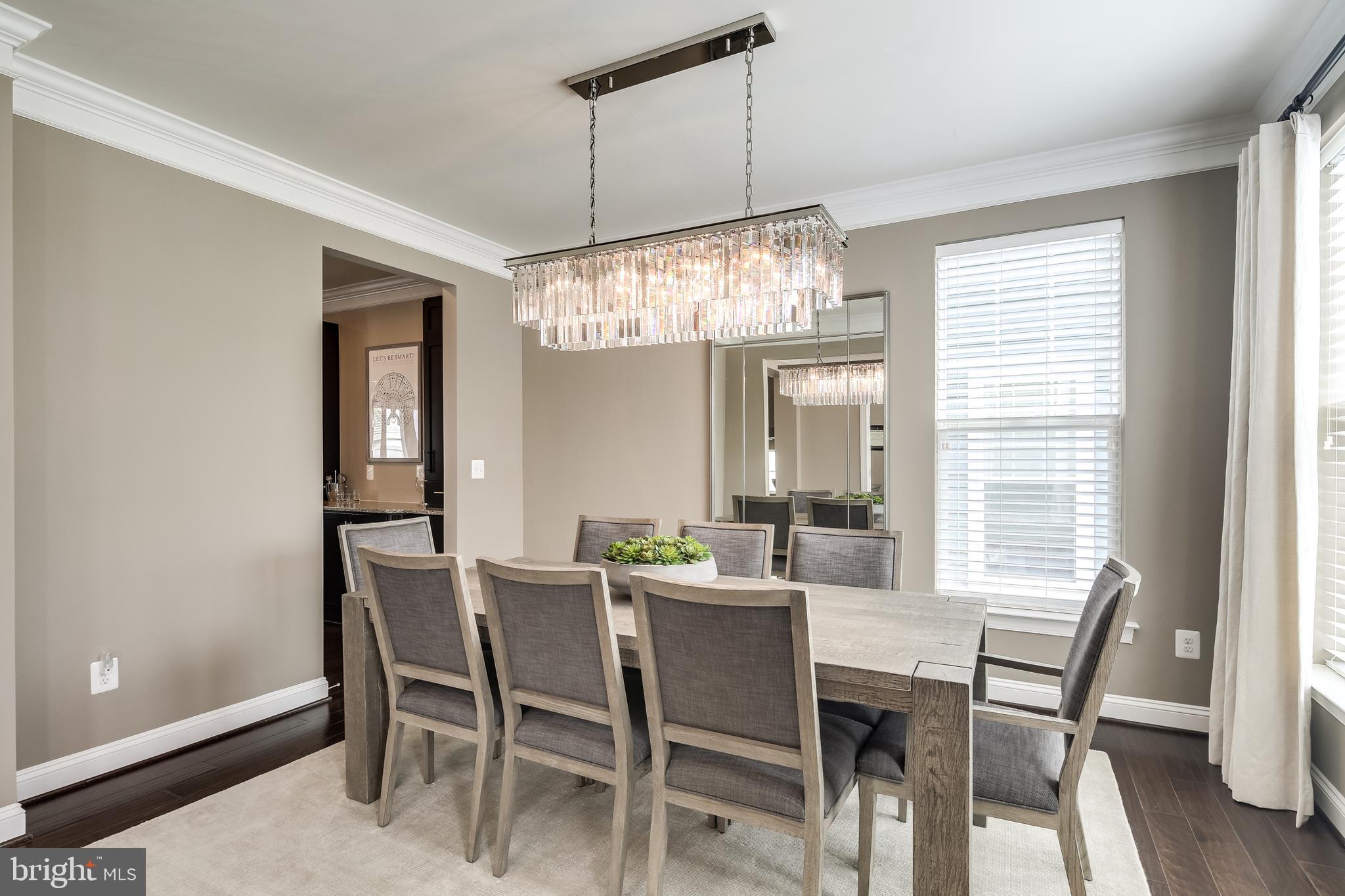 Spacious Dining Room with Upgraded Lighting