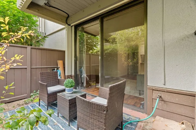 a view of balcony with patio