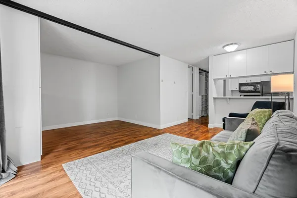 a bedroom with furniture and a bed